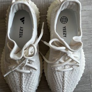 Authentic Yeezy come with box. Worn hand full of time.